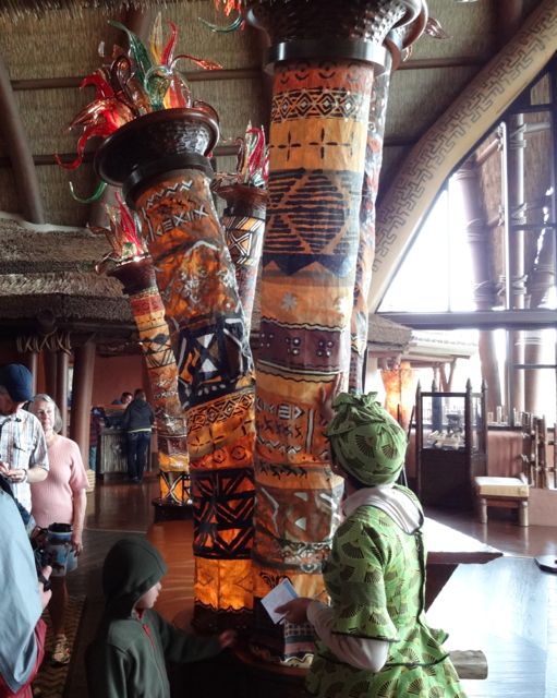 These columns are covered in Kente cloth, the designs have meaning known only to the individual who creates them (note, these don't look like the kente cloths usually seen)