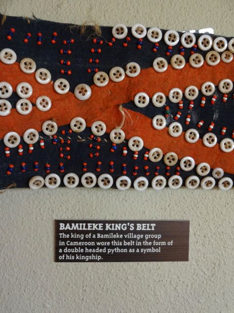 King's Belt - simple strips of fabric with buttons and beads, yet a symbol of power