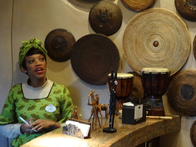 At the check in desk for Sanaa, Lebo explains that the many baskets on the wall are the sort that are used to clean grain of insects etc. The grain is placed on these baskets and tossed lightly so that the lighter weight "dirt" flies away from the grain. Hidden Mickey alert!