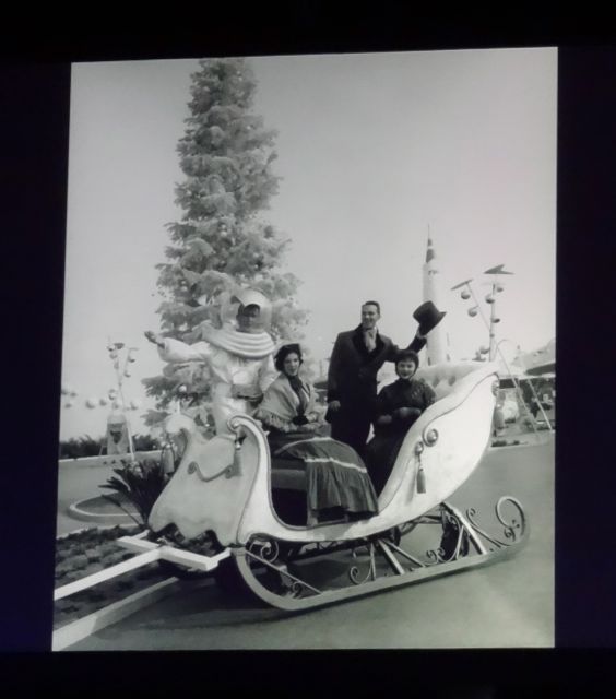 Just a cool photo - Dickensian Cast Members and Space Age Cast Members in the same winter sleigh with a Christmas tree in the background