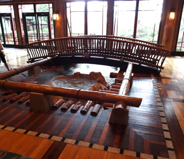 In the Wilderness Lodge Lobby, you'll find this footbridge crossing over the hot springs... The springs turn into Silver Creek which empties into the swimming pool and then flows into Bay Lake (not really!)