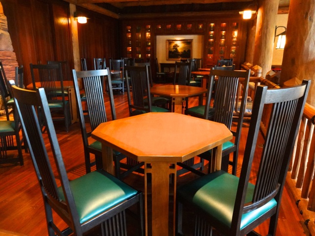 There is a quiet section attached to Whispering Canyon Cafe, this is called the library area. The furniture here is prairie-style arts-and-crafts (think Frank Lloyd Wright). The bookcases in the background contain artifacts from the grand national parks and the railroad hotels periods.