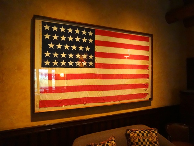 An American flag from 1861, there are 34 stars representing the states. This flag was a gift from the state of Oregon.