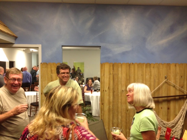 Guests milling around... Really like the sky effect above the fencing...