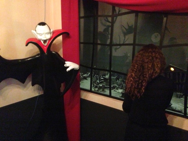 ... there's a "window" next to the vampire (a glassed in area with a diorama...