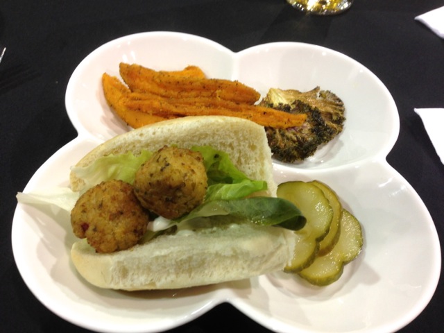 Sweet Potato Wedges, Kale Chip, Pickles, and a Conch Fritter Sandwich