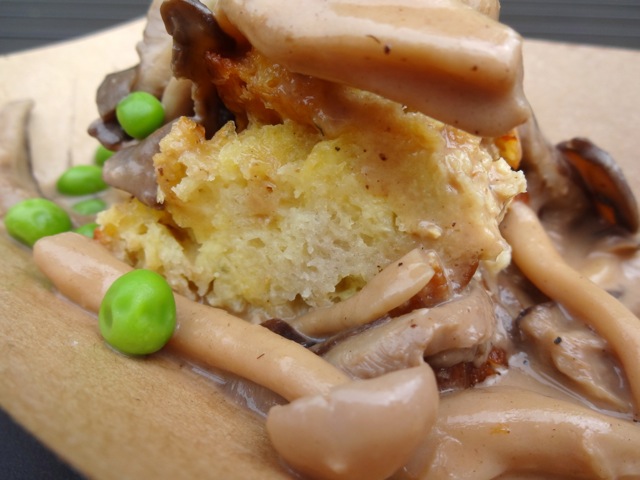 Close-up of savory bread pudding with mushrooms