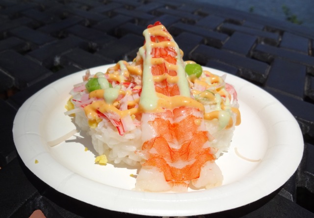 Chirashi Hanazushi (Grilled Salmon, cooked Shrimp, and Crab Stick, over a bed of fragrant Ginger Rice with Volcano and Dynamite Sauce