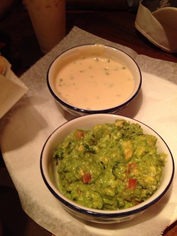 Breakfast cereal bowls of queso jalapeno and guacamole
