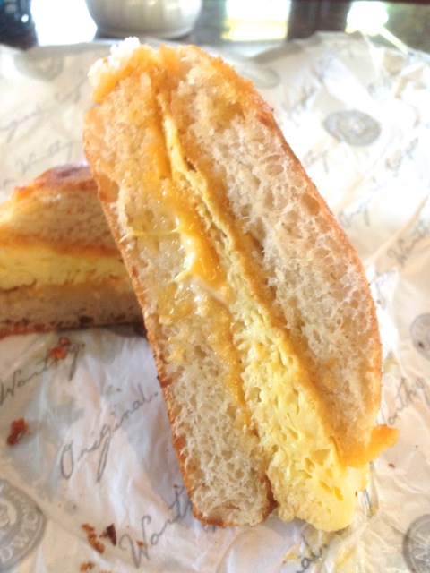 close up of Egg & Cheddar breakfast sandwich