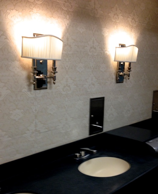 Sink area. The ladies room was all soft creams while this shows that the mens room is done in more masculine colors.