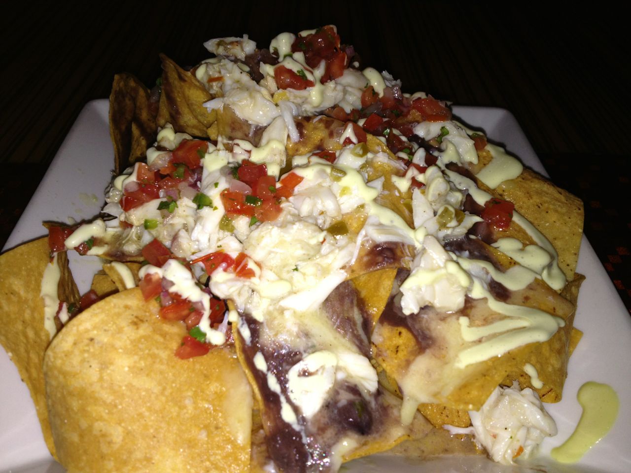 Crab nachos from bluezoo... very happy they're staying (we heard there'd be a rampage if they left :)) - sorry for quality of photo, originally for tweeting not posting