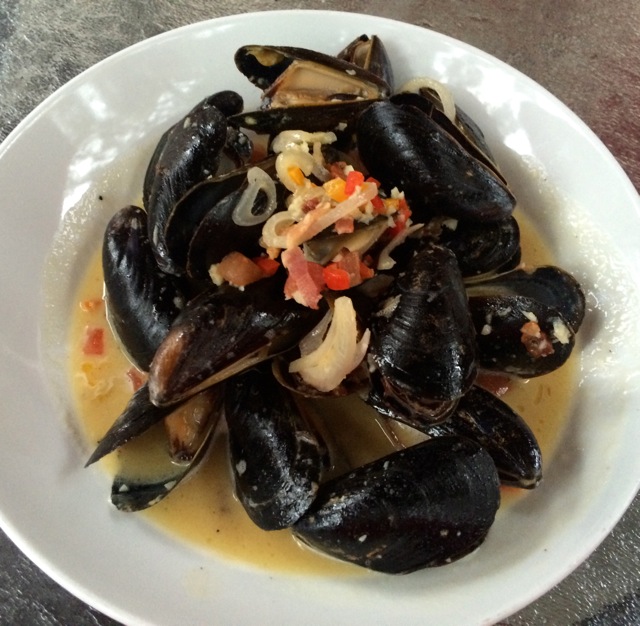 Prince Edward Island Mussels - bacon, white wine & butter sauce, onions, finely diced peppers