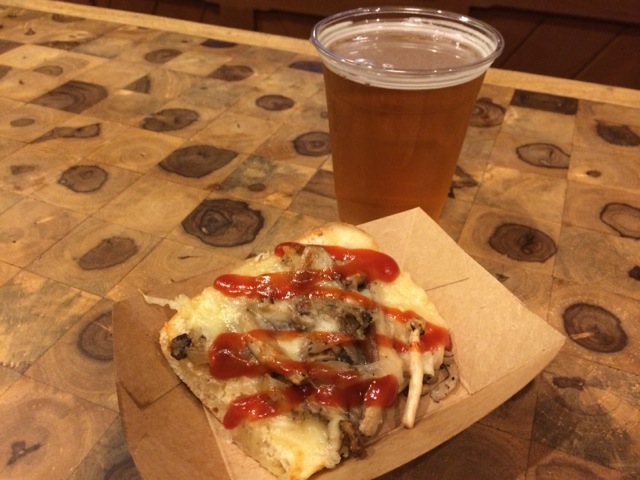 Zapiekanki (toasted mushroom, caramelized onion & cheese bread with house-made ketchup) and Okocim Brewery O.K. Beer