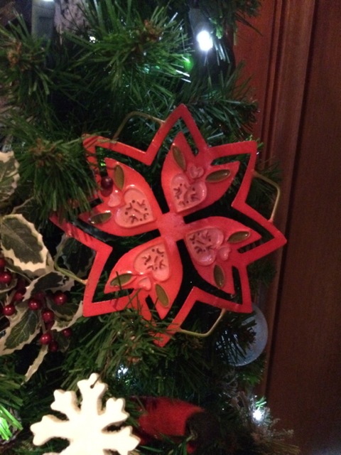a cut out snowflake (very similar to snowflake motifs in knitting)