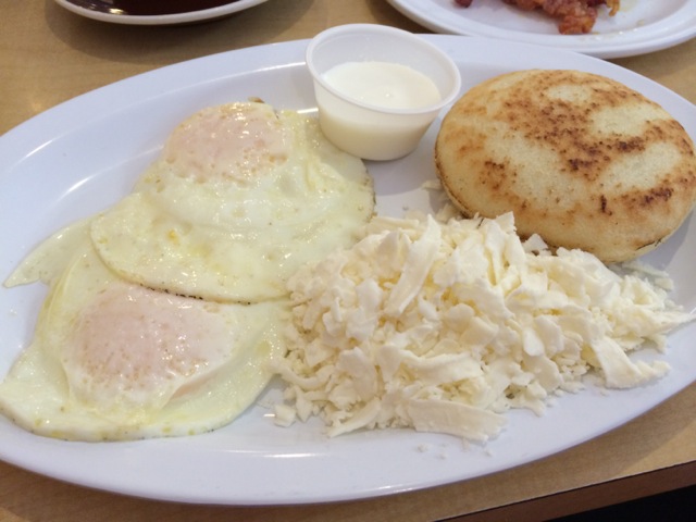 Criolilito $6.99 - 2 eggs over easy, grated cheese, arepa, and salted sour cream